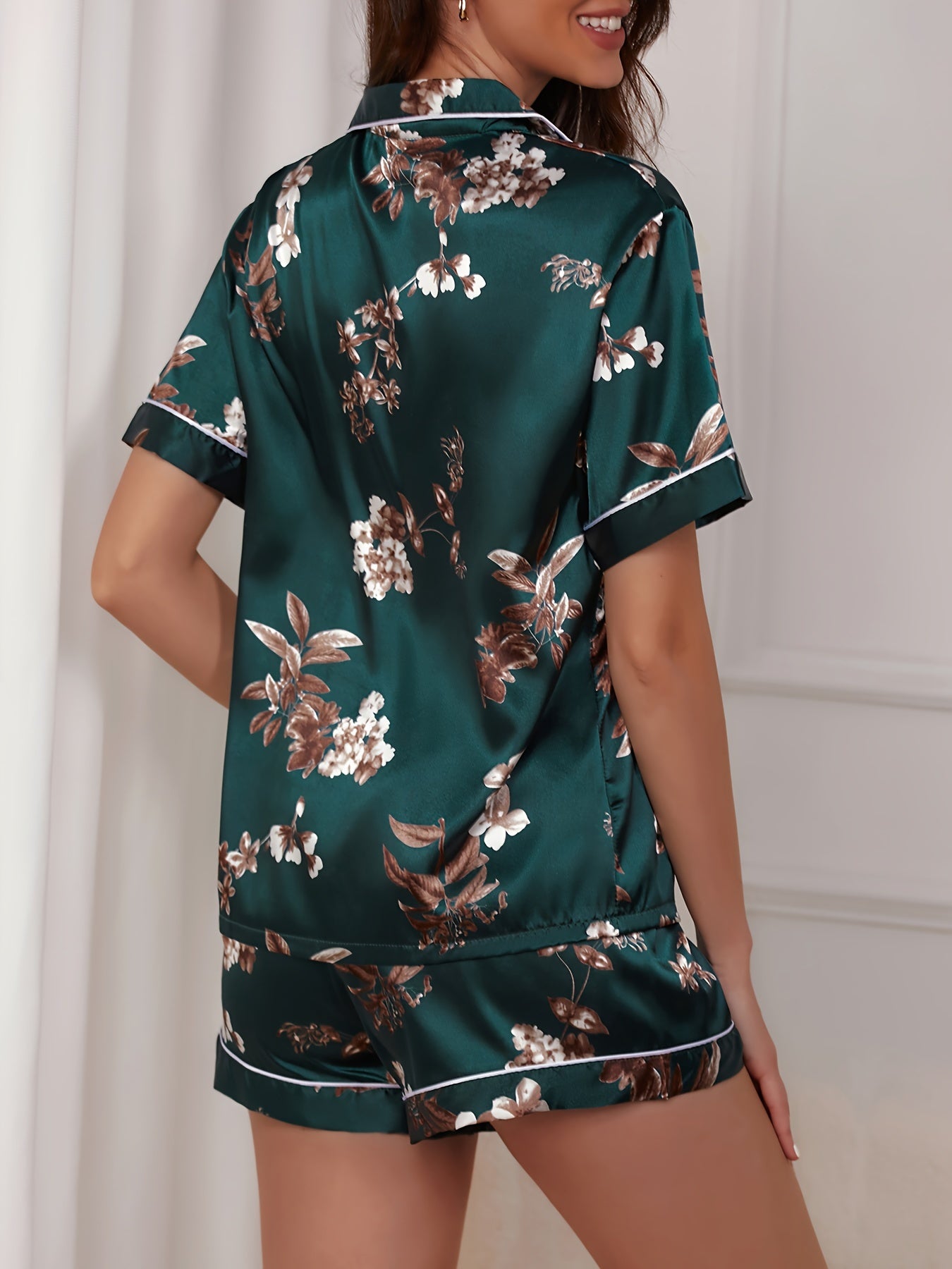 Butterfly printed contrasting satin pajama set, short sleeved top and shorts. Comfort and Leisure